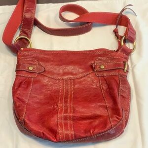 Vintage red leather fossil bag